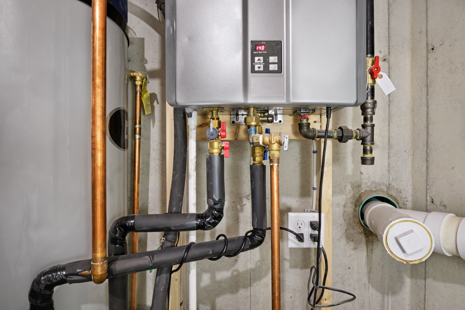 Tankless water heater connected to recirculator